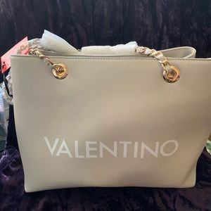 Valentino bag new with tag never use.